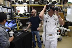 Rear Adm. David Hahn, chief of naval research, tours the National Robotics Engineering Center (NREC) during a visit to Carnegie Mellon University (CMU) in Pittsburgh, Pa.