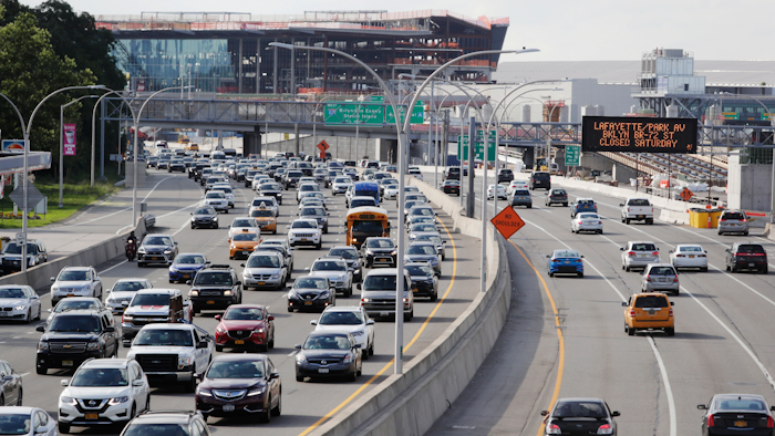 Cars on the Grand Central Parkway pass LaGuardia Airport in New York.