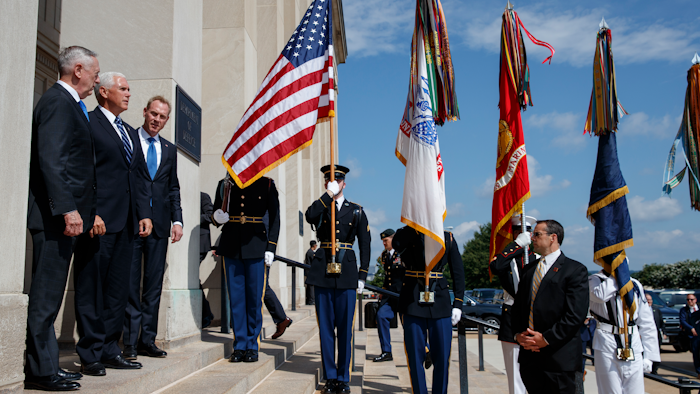 Vice President Mike Pence, center, is greeted by Deputy Secretary of Defense Pat Shanahan, right, and Secretary of Defense Jim Mattis before speaking at an event on the creation of a United States Space Force at the Pentagon.