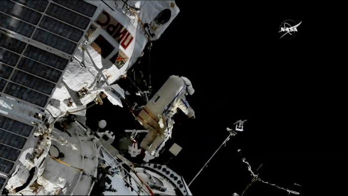 In this image made from video provided by NASA, cosmonaut Sergey Prokopyev flings a Sirius nano-satellite into orbit from the International Space Station on Wednesday, Aug. 15, 2018.