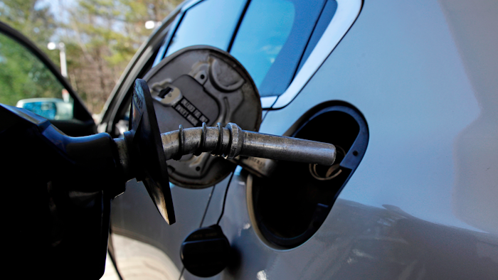 In this April 23, 2018, file photo a car is filled with gasoline at a station in Windham, N.H.