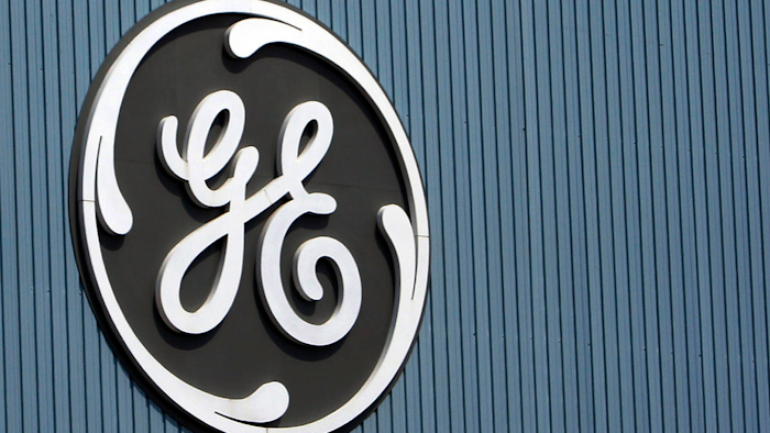 This June 24, 2014, file photo, shows the General Electric logo at a plant in Belfort, France.