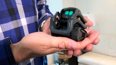 In this Monday, July 30, 2018, photo, Anki Inc. CEO Boris Sofman holds Vector, the company’s new home robot, in New York.