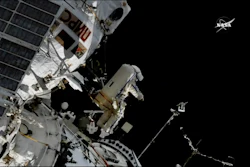 In this image made from video provided by NASA, cosmonaut Sergey Prokopyev flings a Sirius nano-satellite into orbit from the International Space Station on Wednesday, Aug. 15, 2018.