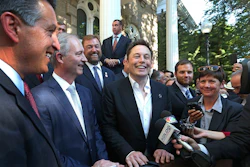 In this Sept. 4, 2014, file photo, Nevada Gov. Brian Sandoval, from left, executive director of the Governor's office of economic development Steve Hill and Tesla Motors CEO Elon Musk answer questions following a news conference at the Capitol in Carson City, Nev.