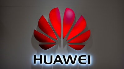 In this Wednesday, July 4, 2018, photo, the Huawei logo is seen at a Huawei store at a shopping mall in Beijing.