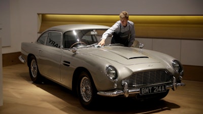The 1965 Aston Martin DB5 driven by actor Pierce Brosnan in his role as James Bond in the 1995 movie GoldenEye at Bonhams auction house in London.