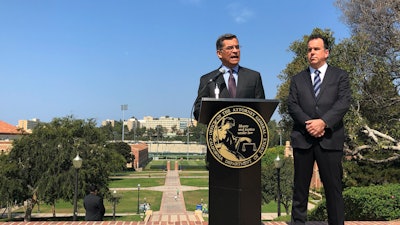 California Attorney General Xavier Becerra speaks at UCLA about his efforts to fight the Trump administration's proposal to weaken car efficiency fuel standards in Los Angeles.