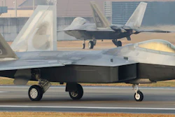 U.S. Air Force F-22 Raptors taxi on the runway upon landing at a South Korean air base in Gwangju, South Korea, Monday, Dec. 4, 2017.