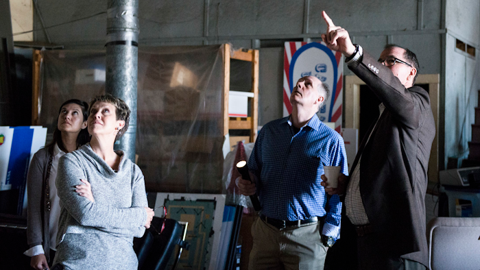 Joe Greene (far right), Montgomery Area Chamber of Commerce vice president of military and governmental affairs, points out architectural features of the chamber of commerce building during a tour for Maxwell Air Force Base and Defensewerx officials March 16, 2018, Montgomery, Alabama.