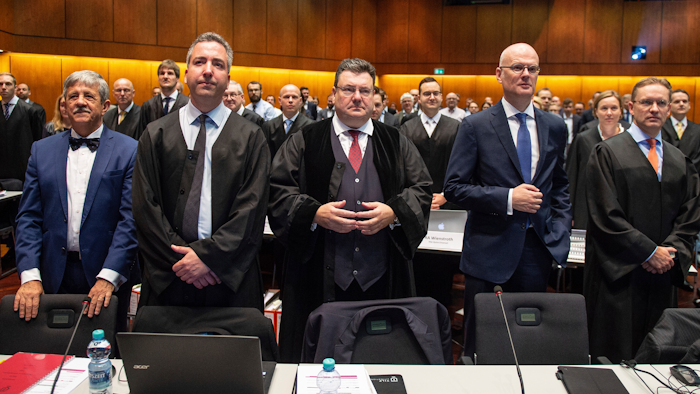 Andreas W. Tilp, lawyer of the plaintiff, waits for the opening of a lawsuit against Volkswagen on compensation for the losses of shareholders caused by the Diesel scandal at the higher regional court in Braunschweig, northern Germany, Monday, Sept. 10, 2018.