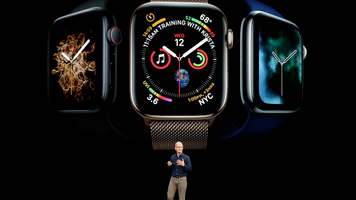 Apple CEO Tim Cook discusses the new Apple Watch 4 at the Steve Jobs Theater during an event to announce new products Wednesday, Sept. 12, 2018, in Cupertino, Calif.