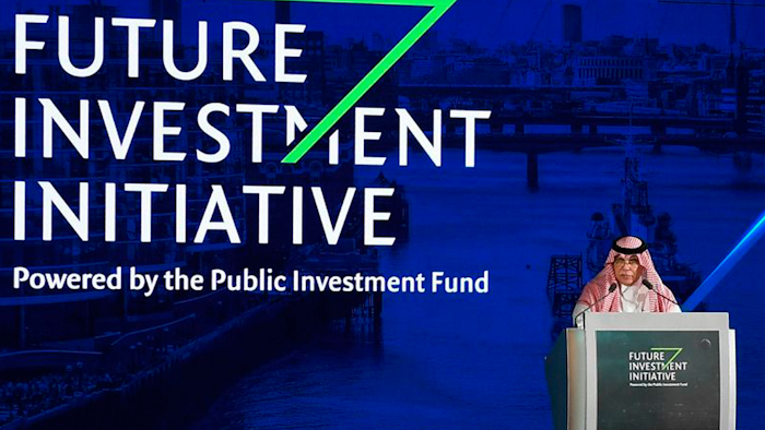 In this Oct. 24, 2017 photograph released by the state-run Saudi Press Agency, Saudi Minister of Commerce and Investment Majid al-Qasabi talks to the audience at the opening of Future Investment Initiative conference in Riyadh.