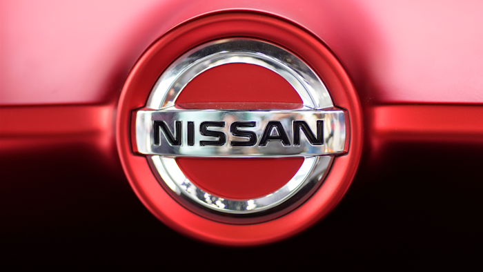 This June 14, 2018, file photo, shows a Nissan logo on a car on display at the automaker's showroom in Tokyo.