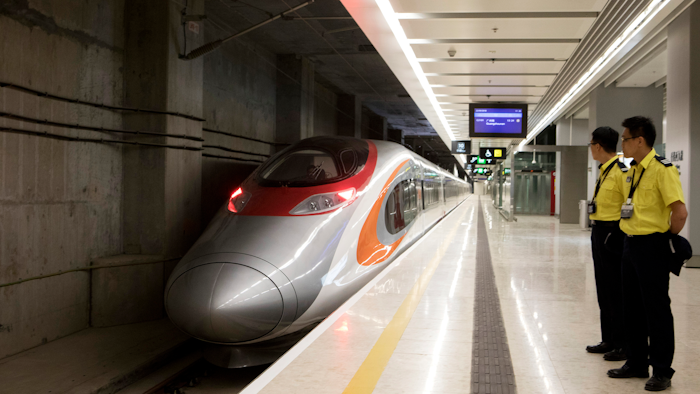 A Guangzhou-Shenzhen-Hong Kong Express Rail Link (XRL) Vibrant Express train bound for Guangzhou Nan Station waits in the Mainland Port Area at West Kowloon Station, which houses the terminal for the XRL in Hong Kong, Saturday, Sept. 22, 2018.