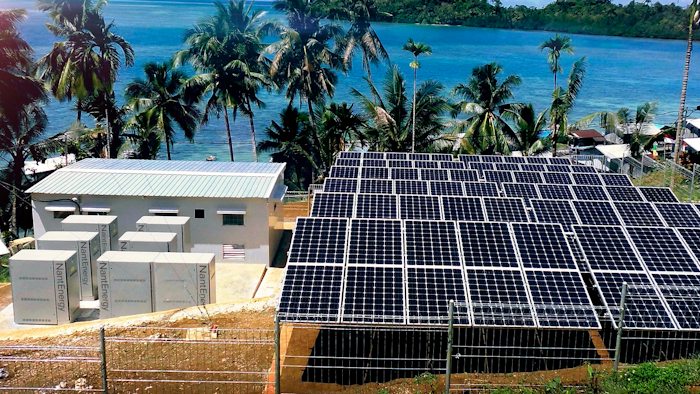 This undated product image provided by NantEnergy shows zinc-air batteries in cabinets at left in a village in Papua, Indonesia.