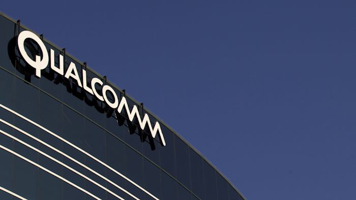 In this Nov. 2, 2011, file photo, a sign sits atop the Qualcomm headquarters building in San Diego.