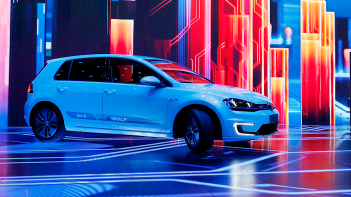 In this Jan. 5, 2016 file photo Volkswagen unveils the e-Golf Touch electric car during a keynote address at CES International in Las Vegas.
