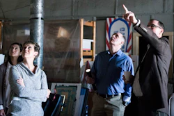 Joe Greene (far right), Montgomery Area Chamber of Commerce vice president of military and governmental affairs, points out architectural features of the chamber of commerce building during a tour for Maxwell Air Force Base and Defensewerx officials March 16, 2018, Montgomery, Alabama.
