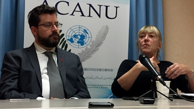 In this Monday, Aug. 27, 2018 file photo, Peter Asaro, left, of the International Committee for Robot Arms Control, and Jody Williams of the Nobel Women's Initiative speak to reporters at a news conference in Geneva, Switzerland.