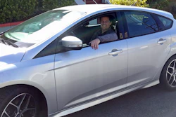 This 2017 photo shows Canvas' first subscriber, James O'Connor, sitting in his car from Canvas.