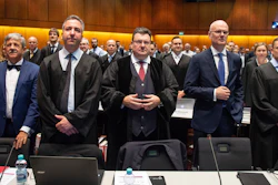 Andreas W. Tilp, lawyer of the plaintiff, waits for the opening of a lawsuit against Volkswagen on compensation for the losses of shareholders caused by the Diesel scandal at the higher regional court in Braunschweig, northern Germany, Monday, Sept. 10, 2018.