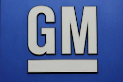 This Jan. 25, 2010, file photo, shows a General Motors Co. logo during a news conference in Detroit.