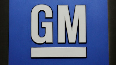 This Jan. 25, 2010, file photo, shows a General Motors Co. logo during a news conference in Detroit.