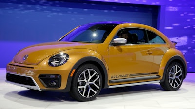 In this Nov. 18, 2015, file photo the 2017 Volkswagen Beetle Dune is displayed at the Los Angeles Auto Show in Los Angeles.