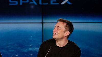 In this Feb. 6, 2018 file photo, Elon Musk, founder, CEO, and lead designer of SpaceX, speaks at a news conference after the Falcon 9 SpaceX heavy rocket launched successfully from the Kennedy Space Center in Cape Canaveral, Fla.