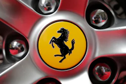 This Monday, Oct. 9, 2017 file photo shows a Ferrari logo on a car outside the New York Stock Exchange in New York.