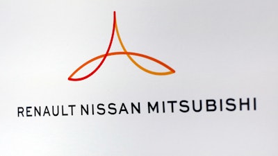 This Friday Sept. 15, 2017 file photo shows the new logo of the Renault-Nissan-Mitsubishi alliance during a press conference in Paris, France.