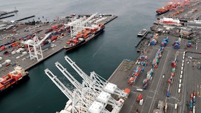 This Feb. 23, 2018, file photo shows cargo cranes at the Port of Seattle in Seattle.