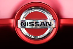 This June 14, 2018, file photo, shows a Nissan logo on a car on display at the automaker's showroom in Tokyo.