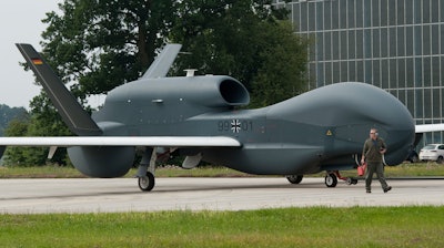 In this Thursday, July 21, 2011 photo a recce drone 'Euro Hawk' is moved at the air base in Manching, Germany.