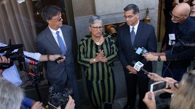 Cal/EPA Secretary Matthew Rodriguez, California Air Resources Board Chair Mary Nichols and California Attorney General Xavier Becerra after speaking during the first of three public hearings on the Trump administration's proposal to roll back car-mileage standards.