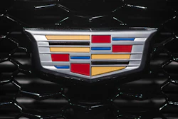 In this March 27, 2018, file photo the Cadillac emblem is shown on the from grill of its XT4 at the New York Auto Show.