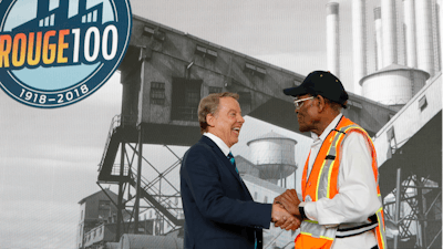 Ford Motor Co., Executive Chairman Bill Ford, left, shakes hands with Willie Fulton, a 65-year employee of the Ford Rouge plant, Thursday, Sept. 27, 2018, in Dearborn, Mich.