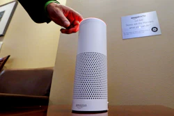 In this May 17, 2017, file photo, an Amazon Alexa device is switched on for a demonstration of its use in a ballpark suite before a Seattle Mariners baseball game in Seattle.