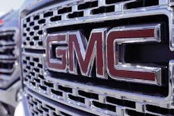 In this April 25, 2017, photo, a GMC truck sits in a General Motors dealer's lot in Nashville, Tenn.