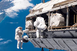 In this Dec. 12, 2006, file photo, made available by NASA, astronaut Robert L. Curbeam Jr., left, and European Space Agency astronaut Christer Fuglesang participate in a space walk during construction of the International Space Station.
