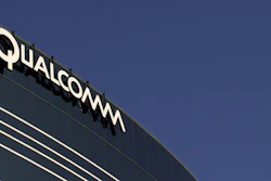 In this Nov. 2, 2011, file photo, a sign sits atop the Qualcomm headquarters building in San Diego.