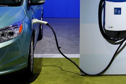 A charging station is displayed at the LA Auto Show in Los Angeles.