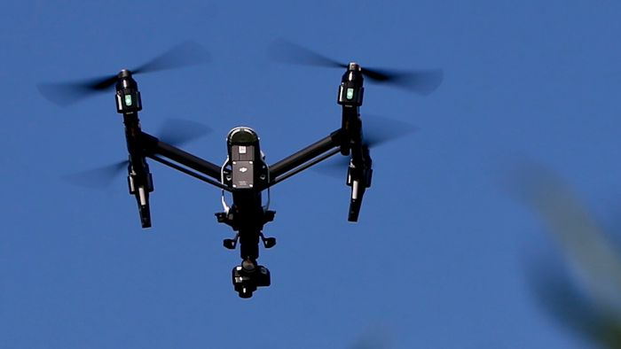 A drone equipped with a thermal camera flies over the plants at the Pennsylvania Department of Natural Resources' Jennings Environmental Education Center on Wednesday, July 11, 2018.