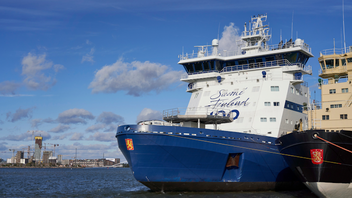 In this photo taken taken Thursday Sept. 27, 2018, the Finnish icebreaker Polaris is moored in Helsinki after an oil spill response drill.