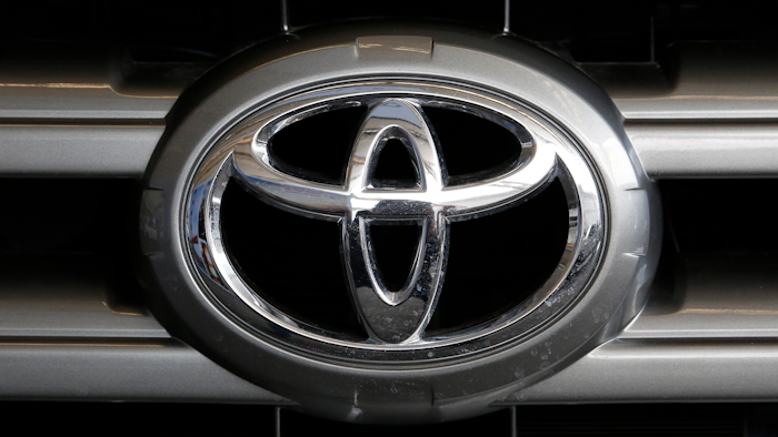 This Feb. 11, 2016, file photo shows a Toyota logo on the hood of a 2016 Toyota Sequoia on display at the Pittsburgh International Auto Show in Pittsburgh.