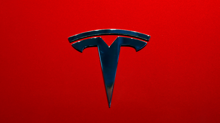 This Oct. 3, 2018, file photo shows the logo of Tesla model 3 at the Auto show in Paris.