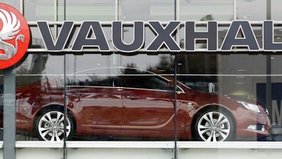 A 2009 file photo of a Vauxhall car dealership opposite the Vauxhall factory in Luton, England.