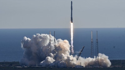 A SpaceX Falcon 9 rocket lifts off from newly refurbished Pad 40 at Cape Canaveral Air Force Station, in Cape Canaveral, Fla, Friday, Dec. 15, 2017.