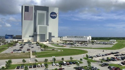 This July 14, 2017, photo shows the Vehicle Assembly Building at NASA's Kennedy Space Center in Cape Canaveral, Fla.
